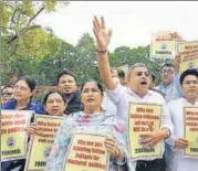  ?? HT FILE ?? n TMC Party leaders shout slogans against Modi government while protesting against NRC in Parliament.