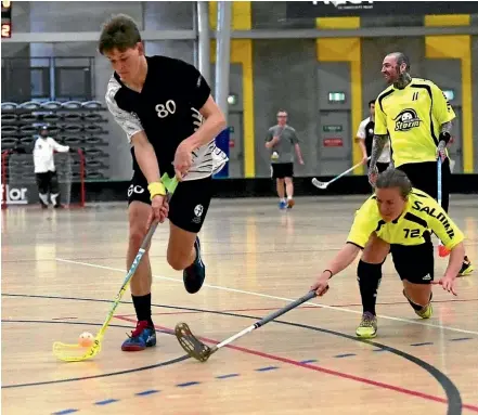  ??  ?? Roughly half of all New Zealand floorball players are from Wellington. Pictured, in black, is Tim Mckibben, 18, of Lyall Bay.