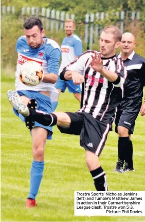  ?? Picture: Phil Davies ?? Trostre Sports’ Nicholas Jenkins (left) and Tumble’s Matthew James in action in their Carmarthen­shire League clash. Trostre won 5-3.