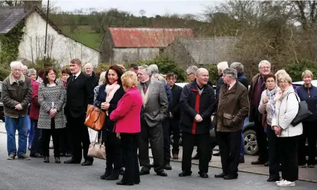  ??  ?? Clockwise from above: Mourners gather at ‘Big Tom’ McBride’s public reposal at Oram Community Centre, Castleblay­ney; Maura McCormack, from Roscommon; Mick Morrissey, from Clonbollog­ue, Co Offaly; sisters Maureen Costello and Kathleen Sullivan, from...