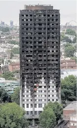  ??  ?? SCENE OF HORROR Remains of Grenfell Tower