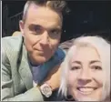  ??  ?? Louise Finn with superstar Robbie WIlliams