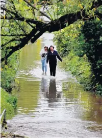  ?? PETER BOLTER ?? River water on the rise in Aberdare