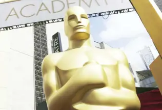  ?? ?? File photo shows the Oscar statue outside Dolby Theatre, the venue for the Academy Awards.