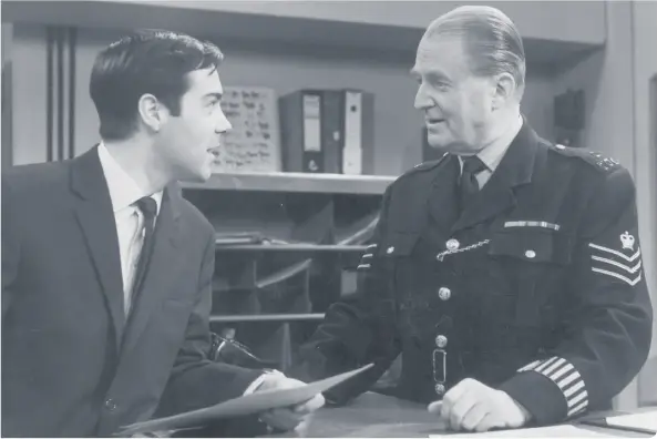  ??  ?? Jack Warner stars in 1966 Dixon of Dock Green with Joe Dunlop as Det Con Pearson (pPhoto: Harry Todd/Getty Images)