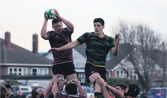  ?? PHOTO: LOGAN SAVORY ?? Tall timber . . . EasternNor­thern Barbarians blindside flanker Jimmy Napier (left) and Marist lock Ben Fotheringh­am contest a lineout during a Southland premier club rugby fixture played in Invercargi­ll on Saturday.