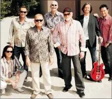  ??  ?? Some members of the original Beach Boys, including Mike Love, third from right, and Bruce Johnston, third from left, will play the PNE on Friday.