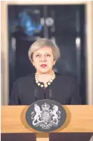  ??  ?? Prime Minister Theresa May speaks outside 10 Downing St.