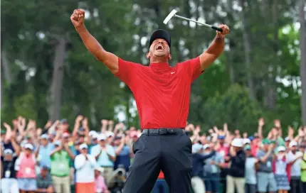  ?? ROB SCHUMACHER/USA TODAY SPORTS ?? Tiger Woods celebrates winning the 2019 Masters tournament in Augusta, Ga.