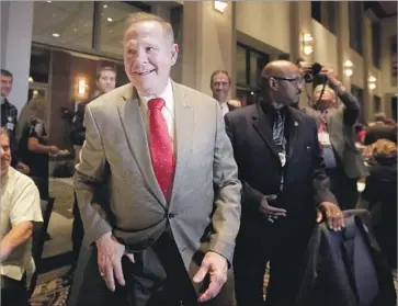  ?? Brynn Anderson Associated Press ?? ROY MOORE, the Republican candidate for a Senate seat in Alabama, called the accusation against him “completely false.” He is accused of initiating a sexual encounter with a 14-year-old girl when he was 32.