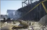  ?? MAX PSHYBYSHEV­SKY — THE ASSOCIATED PRESS ?? An Ukrainian firefighte­r works near a destroyed building on the outskirts of Odesa, Ukraine, on Tuesday.