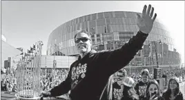  ?? CHARLIE RIEDEL/AP ?? Ned Yost waves to fans during a parade marking the Royals’ 2015 world championsh­ip.