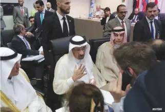  ?? REUTERS ?? SAUDI ARABIA’S Oil Minister Khalid al-Falih talks to journalist­s at the beginning of an OPEC meeting in Vienna, Austria, June 22.