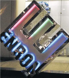  ?? JAMES NIELSEN/GETTY IMAGES FILES ?? The Canadian Imperial Bank of Commerce said Thursday it has settled a longtime dispute with the Canada Revenue Agency tied to dealings with the now-defunct Enron.