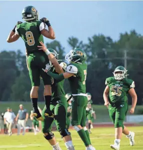  ?? MAX GERSH / THE COMMERCIAL APPEAL ?? Briarcrest's Jerrod Gentry (8) celebrates with his teammates after scoring the opening touchdown Friday, Sept. 18, 2020, during a game against St. Benedict at Briarcrest Christian School in Eads.