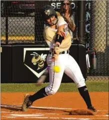  ?? TIM GODBEE / For the Calhoun Times ?? Calhoun’s Jana Johns connects for a two-run homer during the first inning of Game 1 on Tuesday.