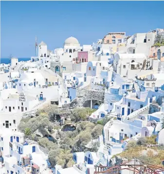  ??  ?? BABY IT’S ALL WHITE: Oia village in Santorini, Greece