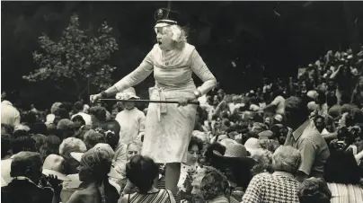  ?? John Storey / The Chronicle 1980 ?? Gladys Sargent dances on a picnic table during the Preservati­on Hall Jazz Band concert in Stern Grove on July 11, 1980. The festival was scheduled for June 14 through Aug. 16 this year but was scrapped due to coronaviru­s concerns. Instead, a weekly series of online videos culled from archives of the festival’s past 13 years is planned, called “Best of the Fest.”