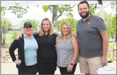  ?? (NWA Democrat-Gazette/Carin Schoppmeye­r) ?? Kristi Coats (from left), Anita Brightwell, Cheryl Yarbrough and Seth Swafford volunteer at the Mercy Golf Classic.