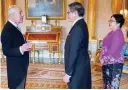  ?? ?? The King meets Singapore’s new high commission­er (centre) this week