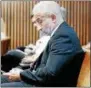  ?? WILL WALDRON — THE ALBANY
TIMES UNION VIA AP ?? Alain Kaloyeros, president of SUNY Polytechni­c Institute awaits his arraignmen­t on state charges while sitting in a courtroom at Albany City Courthouse on 23, 2016, in Albany, N.Y.