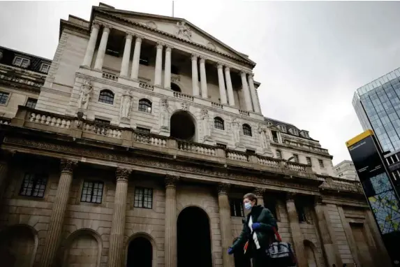  ?? (AFP/Getty) ?? The BoE is unanimous on low rates but signals ‘receding risks’ from early hike