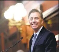  ?? Arnold Gold / Hearst Connecticu­t Media ?? Known for his good nature, Gov. Ned Lamont arrives at a joint session of the General Assembly in Hartford to deliver the State of the State address on Jan. 9.
