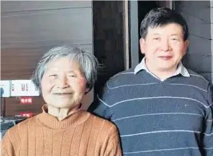  ?? SUBMITTED ?? Kai Huang, right, and his mother Yi. Kai travelled to Wuhan, China, on Jan. 9 with his mother to help sell her apartment. They became trapped when the Chinese government sealed off the city on Jan. 23.