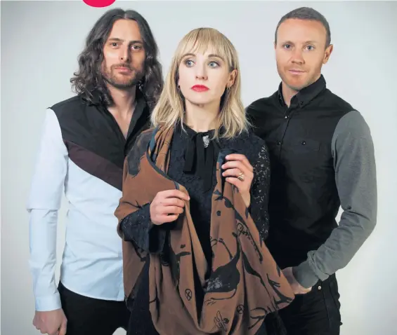  ??  ?? SOUND AND FURY: Welsh band the Joy Formidable regrouped in 2017 at the Utah desert home of singer Ritzy Bryan, center, and expanded artistical­ly.