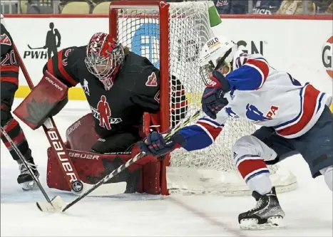  ?? Matt Freed/Post-Gazette ?? Canada goaltender Kristen Campbell stops a wraparound attempt by Team USA’s Amanda Kessel Saturday at PPG Paints Arena in the “Rivalry Rematch” of the teams’ Olympic gold-medal game last month in Beijing.