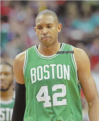  ?? STAFF PHOTO BY STUART CAHILL ?? CAN’T CAPITALIZE: Al Horford shows his displeasur­e during the Celtics’ 92-91 loss to the Wizards last night in Washington, forcing a deciding Game 7 on Monday.