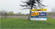  ?? DAVE JOHNSON/WELLAND TRIBUNE ?? A sold sign is seen on the former Welland High School property on Denistoun Street.