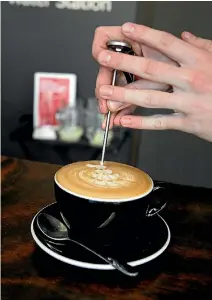  ?? PHOTO: EMMA ALLEN/FAIRFAXNZ ?? Costs such as milk and flavouring will influence the cost of coffee but so will nonprice factors such as convenienc­e and immediacy.