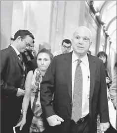  ??  ?? McCain leaves the the Senate chamber at the US Capitol after voting on the GOP ‘Skinny Repeal’ health care bill in Washington, DC. — AFP photo