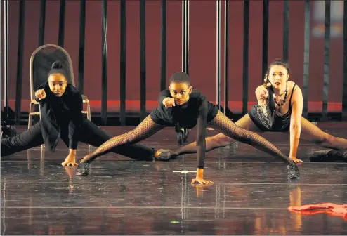  ?? JERRY SLOWIK ?? Tianna Smith, from left, Nia Wright and Izy Hollingswo­rth-Sons were among the performers in GSU Dance Company’s 2018 presentati­on of Dance to the Movies. Hollingswo­rth-Sons, of Beecher, is among the choreograp­hers for From Tina to Beyoncé: 50 Years of Female Empowermen­t.