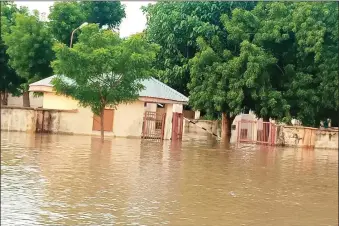  ??  ?? Bagudo LGA General Hospital submerged in flood