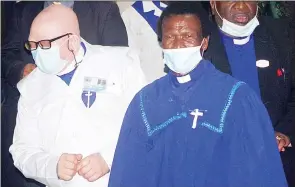  ?? ?? Archbishop Joseph Muzi Gama (L) who replaced Alvinah Gama at St Joseph Christian Church in Zion. With him is Samson Mpika Magagula, who introduced him to His Majesty the King.
