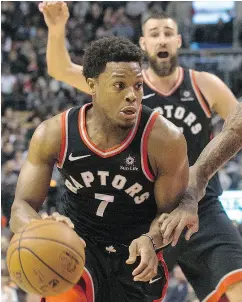  ?? CHRIS YOUNG / THE CANADIAN PRESS ?? Raptors guard Kyle Lowry is averaging 17 points a game, down from the 22½ he averaged a year ago while taking about three fewer shots per game.