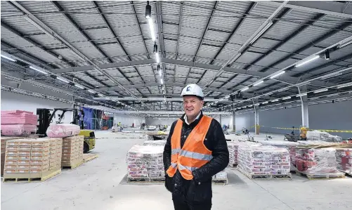  ?? PHOTO: PETER MCINTOSH ?? Sneak peak . . . Otago Land Group Ltd director Martin Dippie stands on the retail floor of the soontobeco­mpleted Kmart Dunedin store, in Andersons Bay Rd.