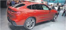  ??  ?? Der BMW X4, ein SUV-Coupé für die Mittelklas­se, soll im Sommer zu den Händlern rollen.