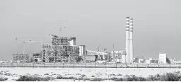  ?? KAMRAN JEBREILI/AP ?? Constructi­on of the coal-powered Hassyan plant in Dubai will cost $3.4 billion.