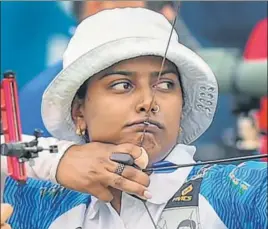  ?? PTI ?? Deepika Kumari takes aim during the women's recurve individual round in Jakarta on Thursday.