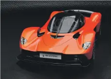  ??  ?? Before the first electric Aston Martin is produced, the Dh11m mid-engined Valkyrie arrives in the Middle East in July