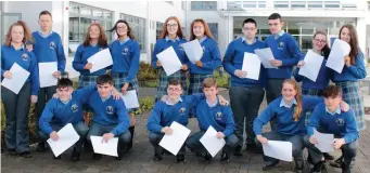  ??  ?? The eight sets of Junior Cert twins from Coláiste Íde agus Iosef, Abbeyfeale, Co Limerick: Back row, Christophe­r and Chloe Lane, Michelle and Noelle Curtin, Shona and Caoimhe Hickey, Gearoid and Jamie Browne, Maeve and Orla Quirke; front row (from...