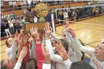  ??  ?? Greenway celebrates winning the 4A state volleyball title over Salpointe Catholic in straight sets on Monday night.