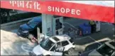  ?? PROVIDED TO CHINA DAILY ?? Cars refuel at a Sinopec gas station in Qingdao, Shandong