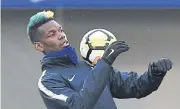  ?? AFP France midfielder Paul Pogba controls the ball during training. ??