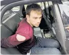  ?? Picture / AP ?? Police say Travis Reinking lay down on the ground to be handcuffed when they confronted him.