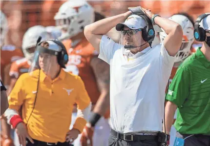  ?? RICARDO B. BRAZZIELL/USA TODAY SPORTS ?? Texas cut football coach Tom Herman’s pay but has promised to pay him back before the end of his contract.