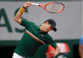  ?? Josek, AP) (Photo by Petr David ?? Japan’s Kei Nishikori breaks his racket in his third round match of the French Open tennis tournament against Korea’s Hyeon Chung on Saturday.